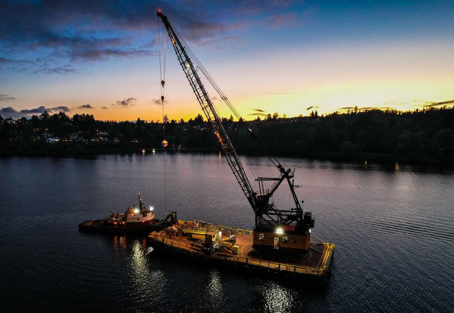Dock builder working on a floating dock frame at the Lake of the Ozarks